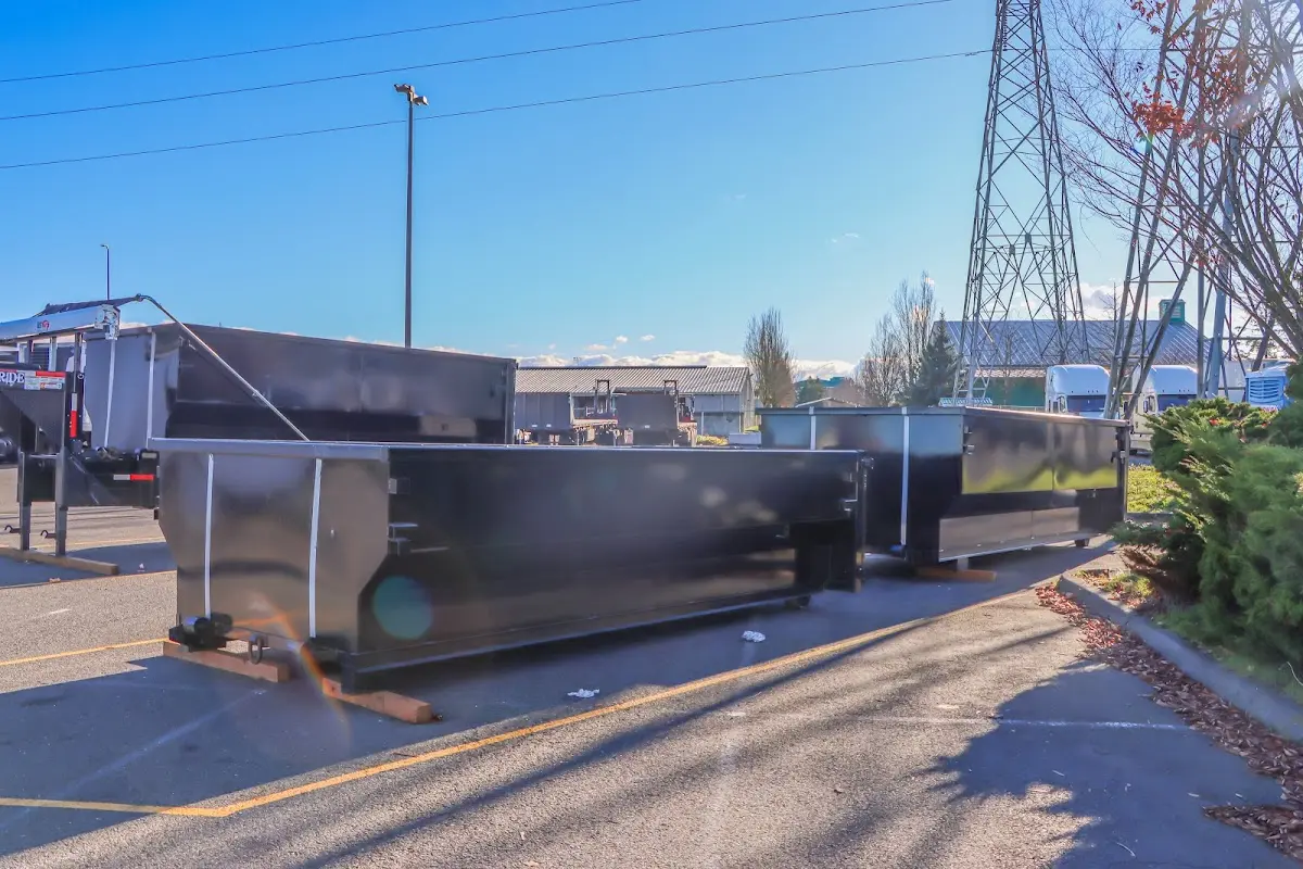 Roll-off dumpster ready for waste disposal at job site for 2 Yard Dumpster Rental in White City